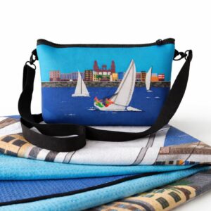Pack toalla waffle reciclada y bolso neopreno Vela Latina con Vegueta y barcos de vela latina canaria